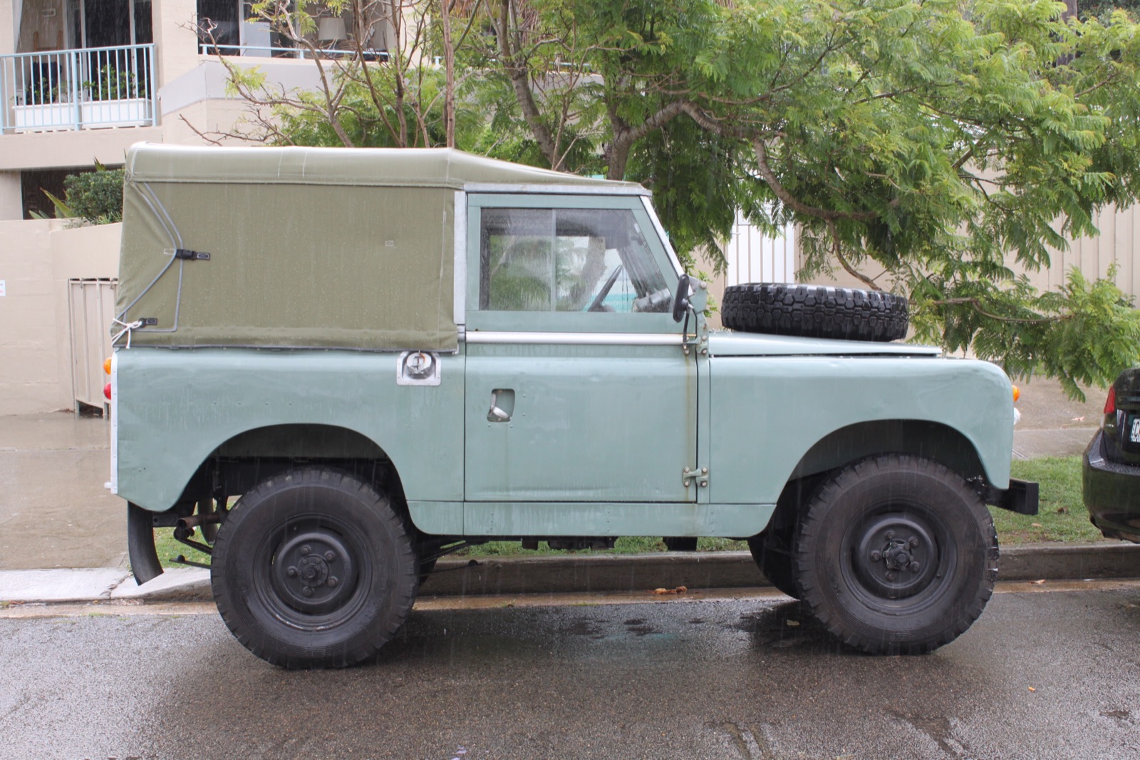 A 1961 Land Rover Series IIA 88 soft top in Sydney: the short-wheelbase type the three surveyors drove the length of the Canning in 1968 (not one of the expedition cars).