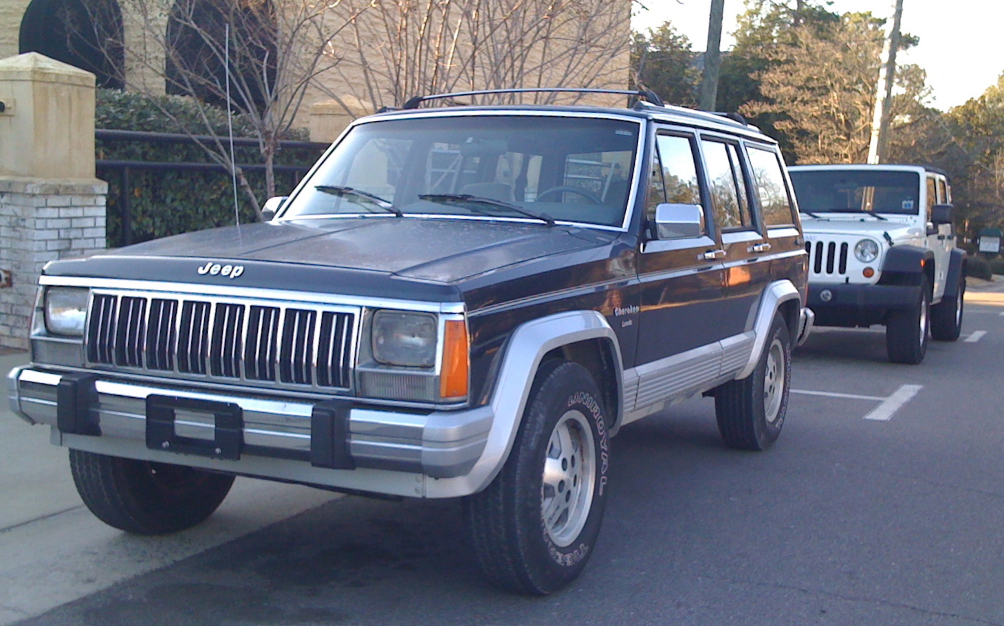 Cherokee XJ Laredo — Jeep Cherokee (XJ) Laredo four-door SUV finished in dark blue, front left