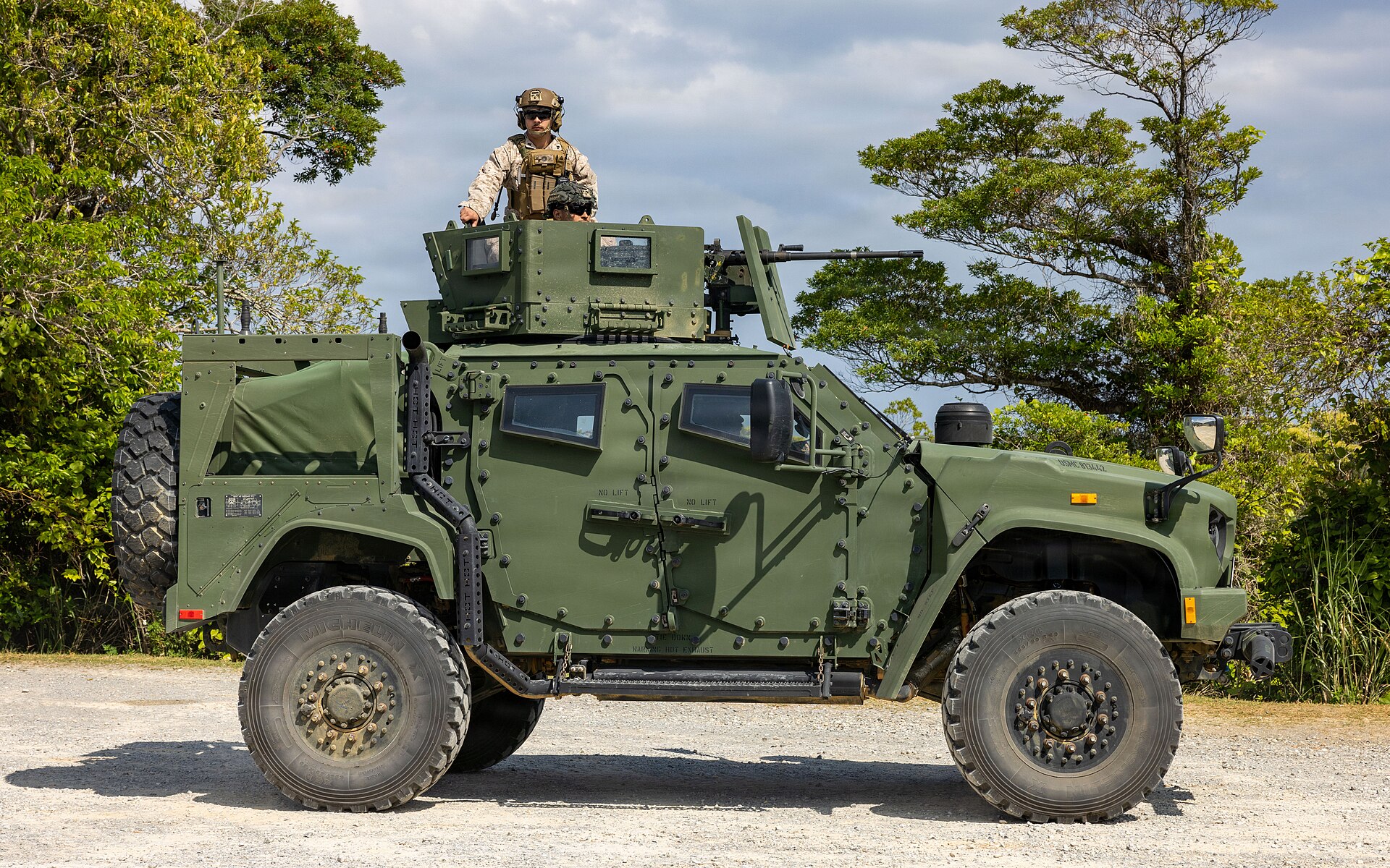 JLTV M1278 Heavy Guns Carrier — U.S. Marines with 12th Littoral Combat Team, 12th Marine Littoral Regiment, 3rd Marine Division, operate an M2A1 .50-caliber machine gun mounted to a joint ligh