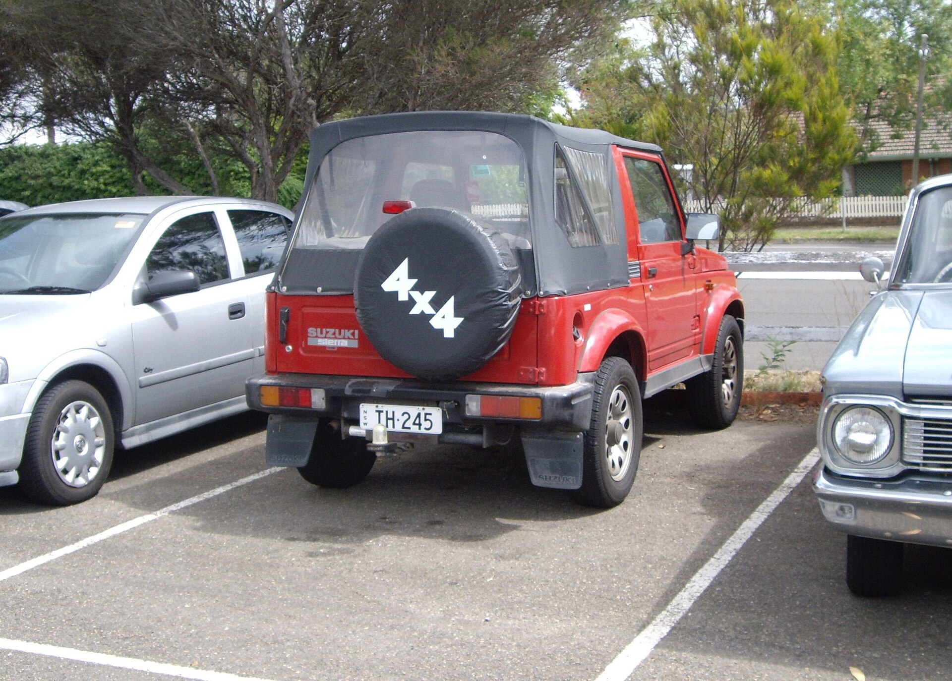 Sierra and Stockman (Australia) — 1998 Suzuki Sierra. The ever popular Suzuki SJ. Red is a somewhat unusual colour for these, normally they are found in a more utilitarian scheme like white. Thi